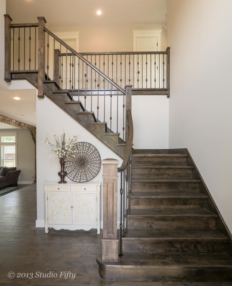 Sloid Alder flared stair with custom flat panel box newel post